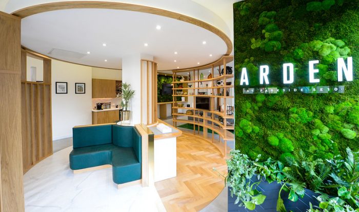 Living wall in Arden marketing suite with signage by Octink