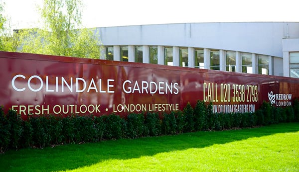 Colour matched red hoarding for colindale