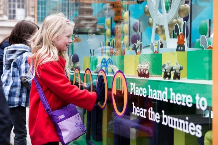 An outdoor interactive 3D graphic Easter display at London Eye by Octink