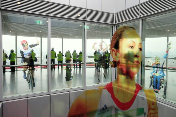 See through Olympic athlete window graphics at Park in Progress by Octink 